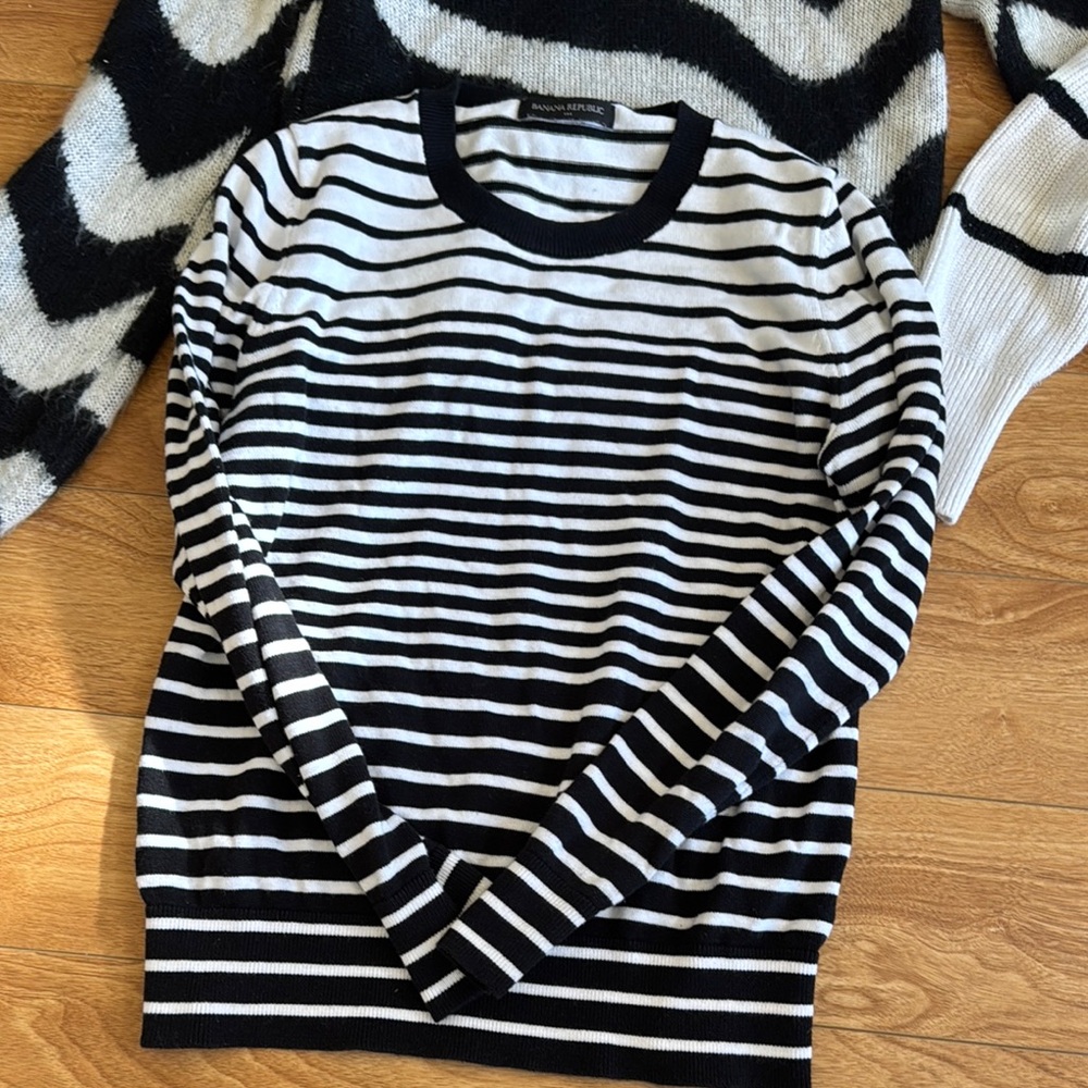Black and White Crewneck Sweater with Bold Patterns